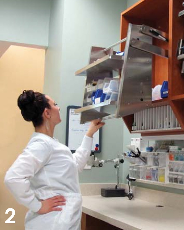Dental cabinetry 3 step pulldown in action, step 2