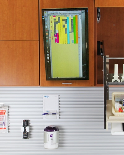 Manhattan cabinetry with sink, drawers, and overhead storage, designed for medical workspaces.