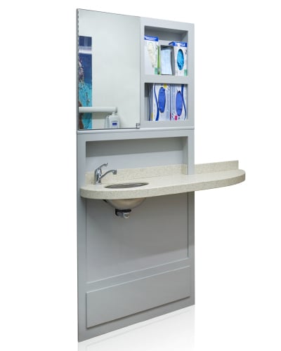 Ergonomic dental cabinetry with corner sink, monitor mount, and upper storage in a compact operatory layout.