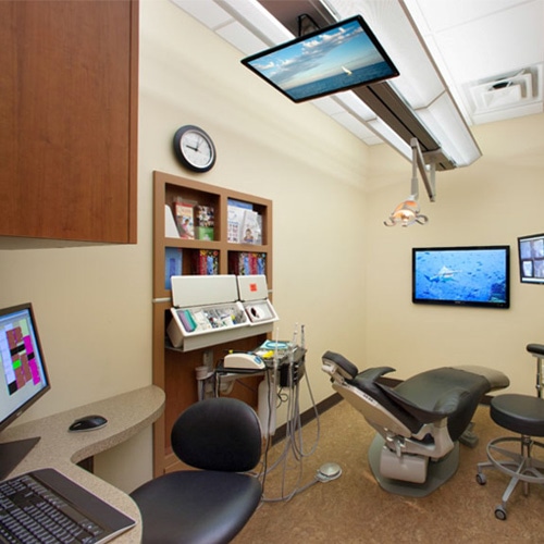 Expanded dental hygiene cabinetry with integrated sink, wide countertop, and multiple storage compartments in a clinical setting.
