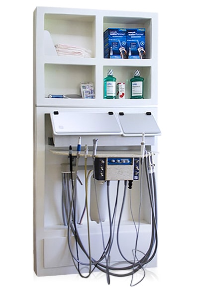 Hygiene workstation with wall-mounted dispensers, gloves, and masks organized for clinical access.