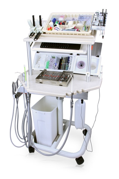 Universal workstation with monitor mount, storage compartments, and ergonomic layout in a clinical environment.